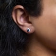 thumbnail image 5 of 10K White Gold 5x3 MM Oval Blue Topaz and Diamond Halo Stud Earrings (I-J Color, I1-I2 Clarity), 5 of 6