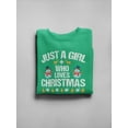 thumbnail image 3 of A Girl Who Loves Christmas Sweatshirt Women -Image by Shutterstock, Female 3X-Large, 3 of 4