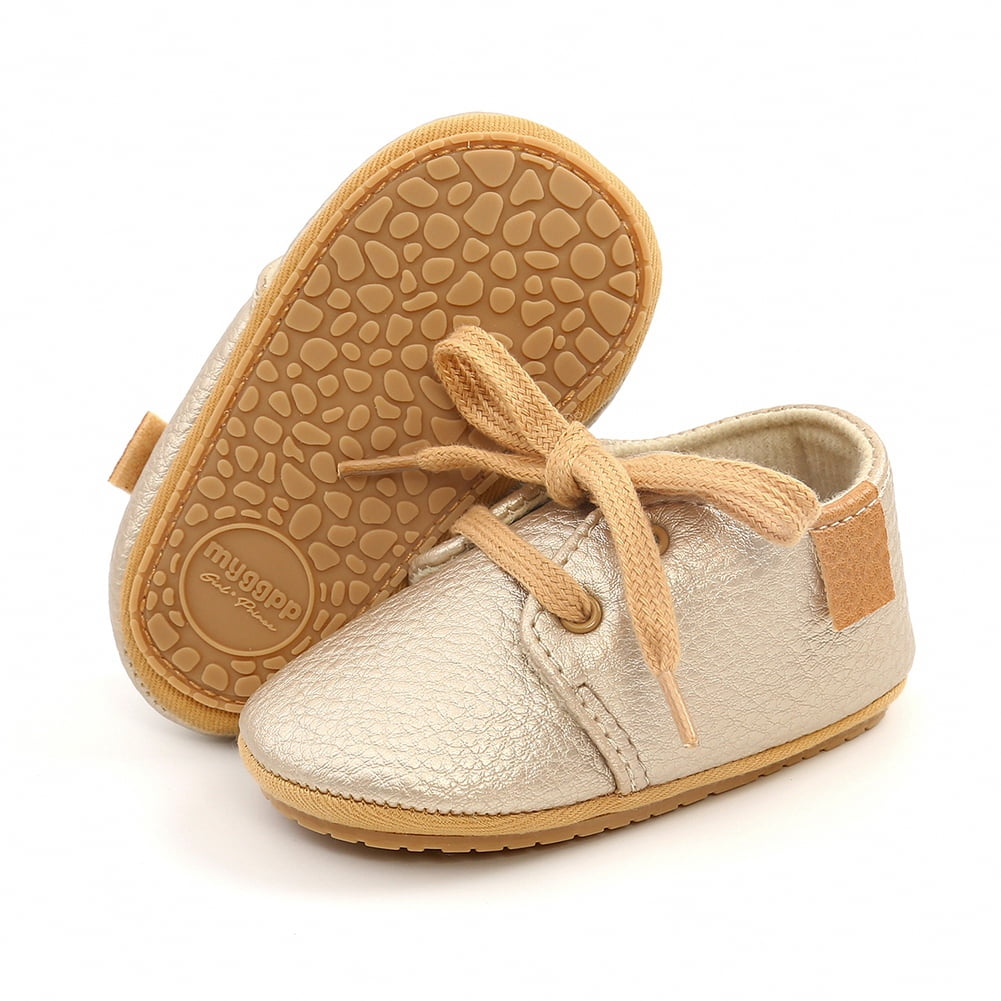 boys black and gold sneakers