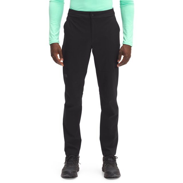pantalón the north face paramount active para hombre tnf black - 42r pantalón negro slim frontal con cierre de botón y cordón interno en cintura, corte ajustado con costuras en rodillas para movilidad, bolsillo con cremallera en pierna derecha y bolsillos para manos, logo serigrafiado en dobladillo izquierdo y FlashDry en costura lateral, entrepierna 29" (R 31" L 33"); adecuado para actividades al aire libre y a menudo usado también como pantalón ligero de viaje.