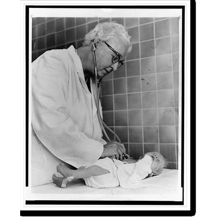 Historic Print, Dr. Virginia Apgar welcoming world's newest guest.World Journal Tribune photo by Al Ravenna., 16" x 20"