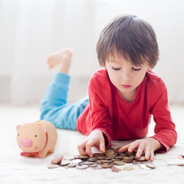Bonita e interesante casita con alcancía para niños, ideal para exhibir en la mesa regalos creativos.
