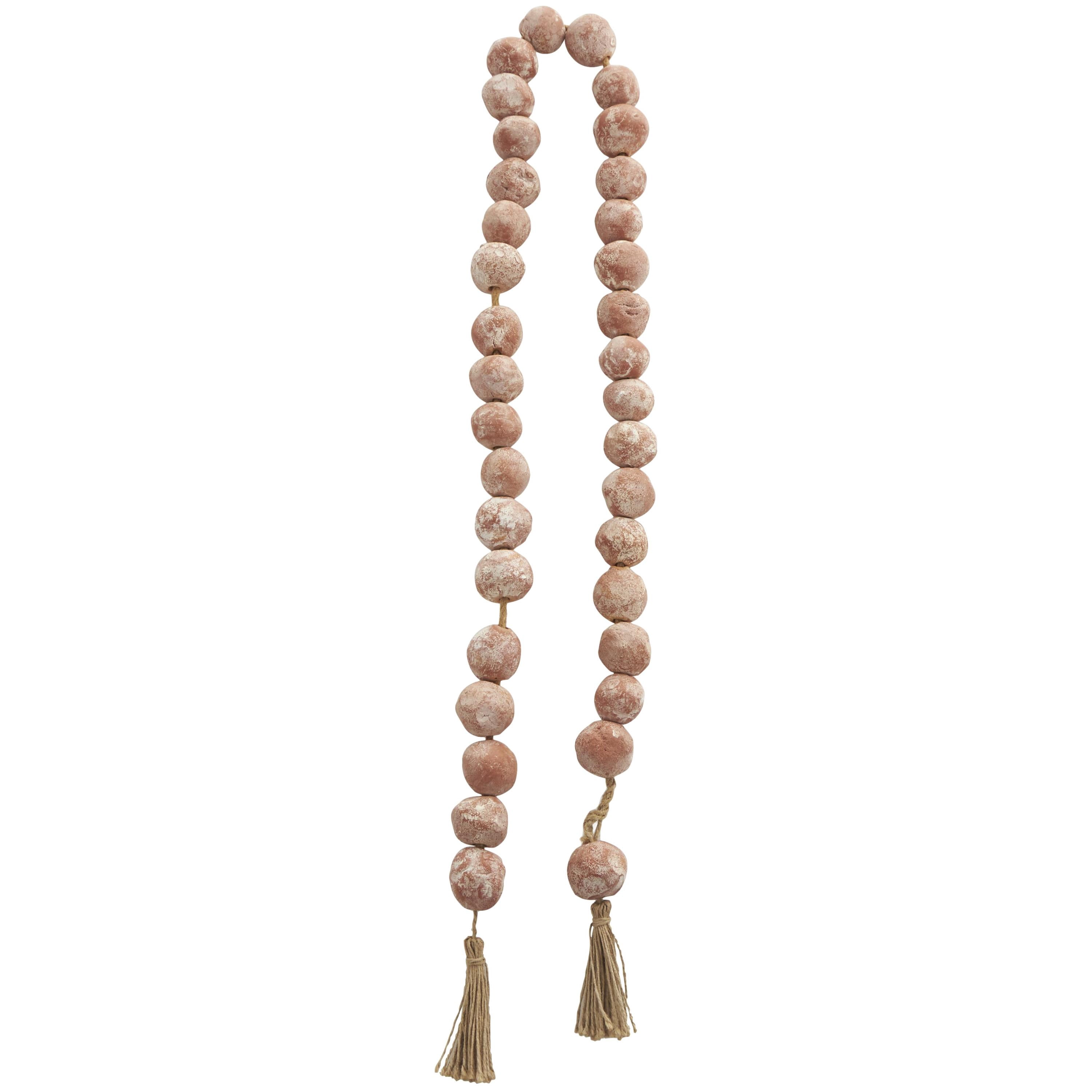 DecMode Handmade Round Intricately Shaped Large Distressed Orange Ceramic Garland with Tassel