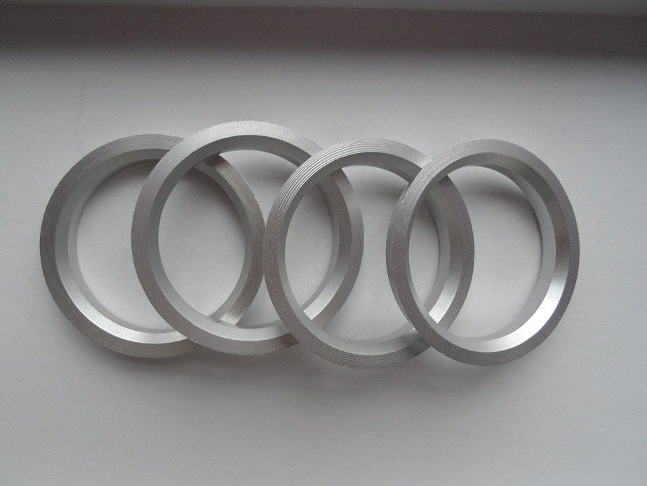 A Set of Aluminium Hub Centric Rings 67.1x70.4mm 