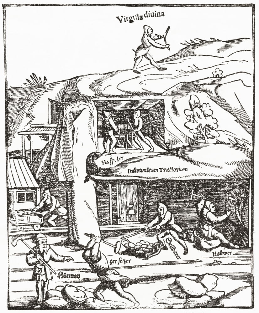 Early representation of the Divining Rod showing a figure with a diving rod above ground searching for water coal or gold and the miners below ground toiling to find coal From The Strand Magazine publ