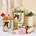 thumbnail image 4 of 12 Pcs Paper Bags with Handle Gift Bags with Ribbon Bowknot 5.51x2.76x5.91 Inch Party Favor Bags Goodie Bags for Christmas Business Shopping Wedding Birthday Party Supplies Light Yellow, 4 of 9