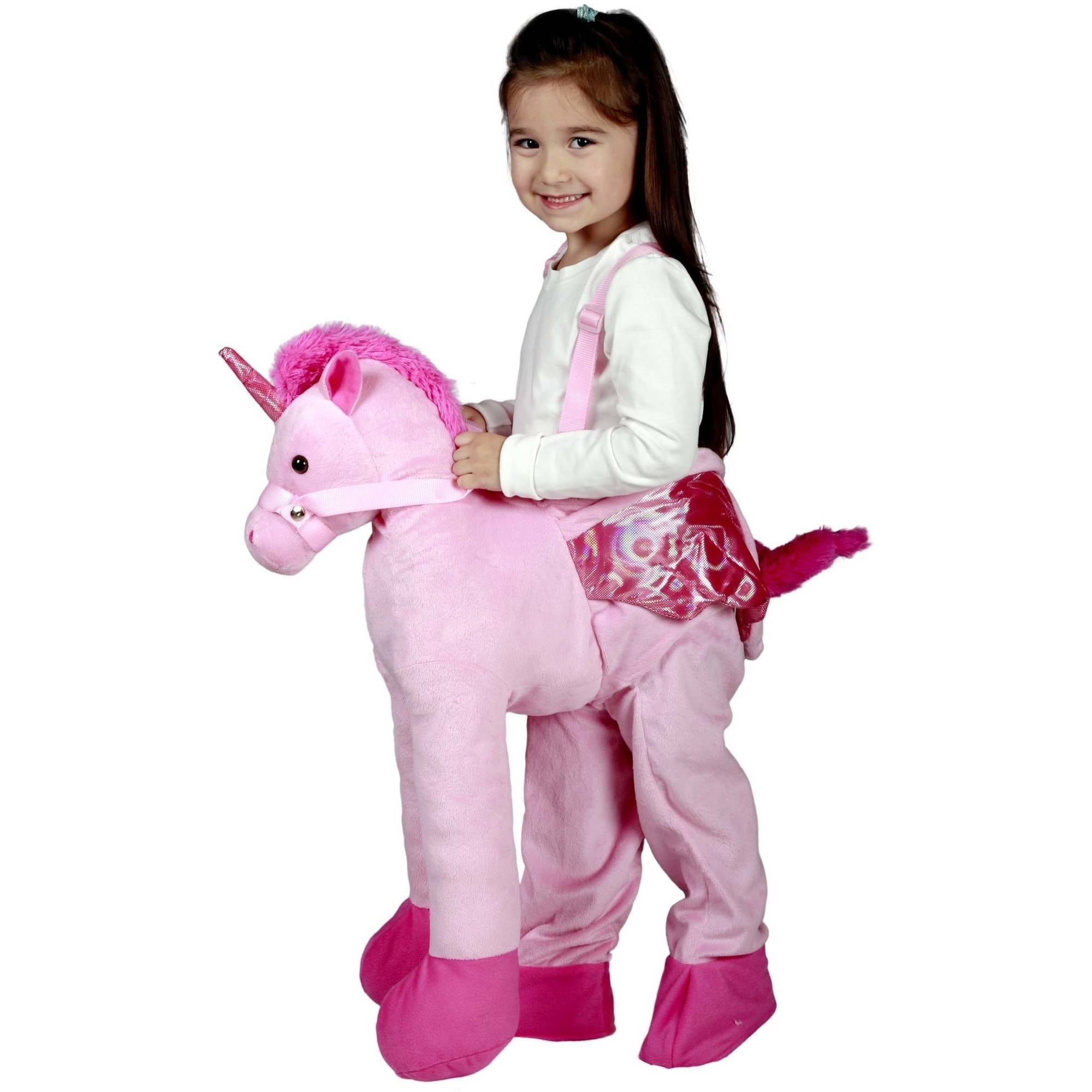 toddler riding unicorn