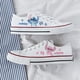 thumbnail image 1 of Disney Lilo &amperio; Zapatos de lona de puntada, zapatos con patrón de pequeño monstruo de dibujos animados Kawaii, zapatos de lona bajos deportivos informales a la modaR01642 Deng Xun unisex, 1 of 2