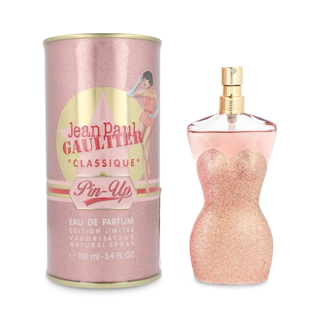 jean paul gaultier classique pin-up 100 ml edp spray frasco torso femenino rosa con purpurina y atomizador dorado junto a lata cilíndrica rosa con logo; fragancia oriental vainilla para dama, 100 ml. Adecuado también para coleccionistas de ediciones limitadas.