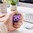 thumbnail image 2 of Halloween Pumpkin Squishy Toy, Purple Glitter Jack O Lantern Stress Ball with Green Stem, Slow Rising Fidget Toy, Sensory Squeeze Ball for Adults, Halloween Party Favor Gift, 2 of 3