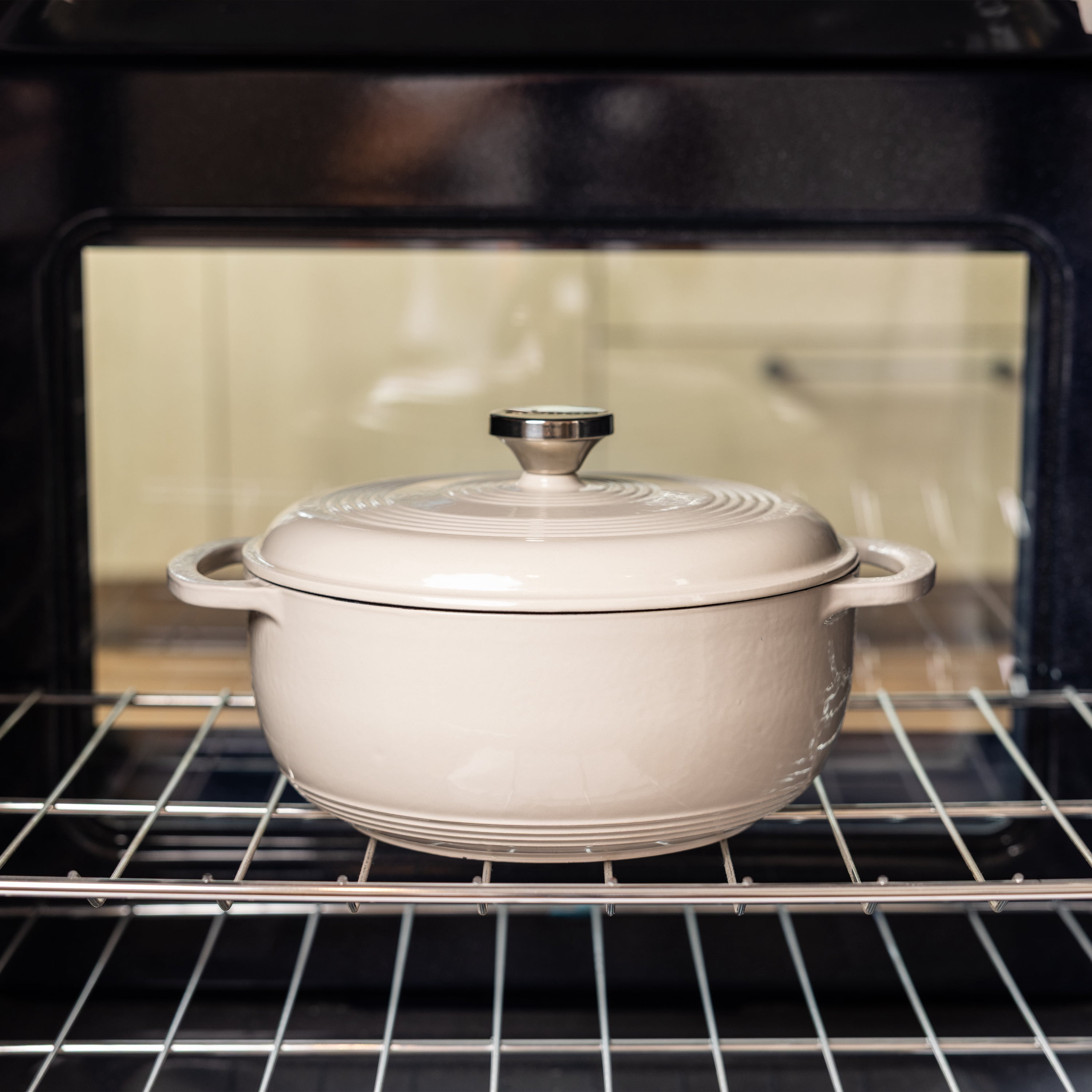 Lodge 4.5 Quart Enameled Cast Iron Dutch Oven with Lid – Dual Handles – Oven Safe up to 500° F or on Stovetop - Use to Marinate, Cook, Bake, Refrigerate and Serve – Oyster