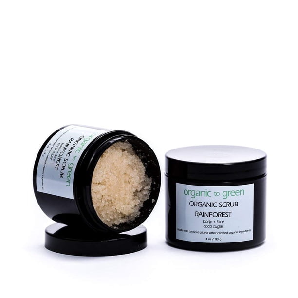 Exfoliante de azúcar y aceite de coco orgánico a verde de la selva tropical