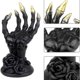thumbnail image 1 of Soporte para anillos y joyas con forma de mano de esqueleto Yyuenw, artesanías de resina para Halloween, manos de pánico, decoración para fiestas y el hogar., 1 of 5
