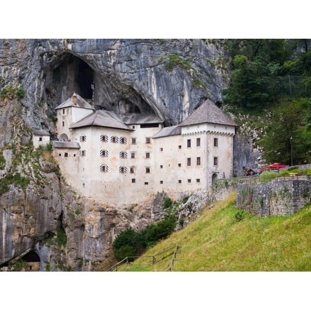 South Cave Castle Christmas Predjama, Inner Carniola, Slovenia. Predjama Castle, built into the opening of a cave. Print Wall Art ()