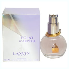 TERNOPIL, UKRAINE - SEPTEMBER 2, 2022 Lanvin Eclat Darpege Perfume Bottle  On Shiny Glitter Background In Pink And Purple Colors Stock Photo, Picture  and Royalty Free Image. Image 193486780.
