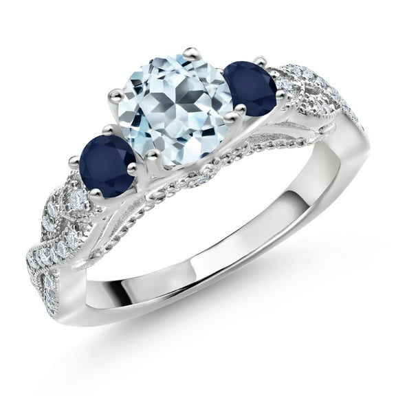 Gem Stone King 925 Sterling Silver Sky Blue Topaz Blue Sapphire and White Moissanite Engagement Ring for Women (1.57 Cttw, Gemstone November Birthstone, Round 6MM and 3MM, Size 7)