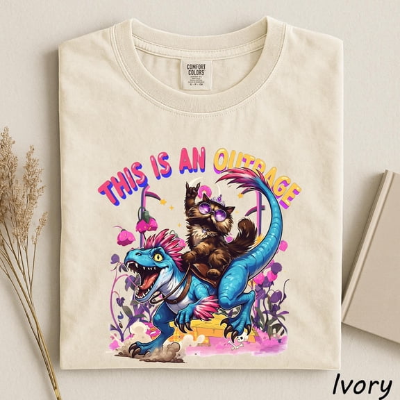 This is an Outrage T-Shirt, Princess Donut and Mongo Top, Dungeon Crawler Carl Shirt, Cat Lover Tshirt, Dinosaur Graphic Tee