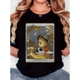 thumbnail image 1 of Women's Retro Minimalist "XVII THE WIZARD" Frog & Slug Graphic Tee - Black Round Neck Short Sleeve T-Shirt, Casual Comfort Fit, Machine Washable, Everyday Tshirt | Whimsical Print | Fabric, Frog T Sh, 1 of 7