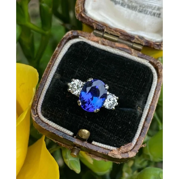 4.00Ct Oval Cut Lab Created Blue Sapphire Women's 3-Stone Ring in 14K Yellow Gold Plated