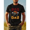 thumbnail image 1 of T-shirt Graphique pour Homme Bad Dad - 100 % Coton, Respirant et Élégant, Noir avec Imprimé Rouge et Jaune, Col Rond Décontracté Court, 1 of 5