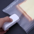 thumbnail image 1 of Mini Sellador Minisellador Mini portátil práctico sellador de bolsas de plástico máquina de sellado doméstico (blanco), 1 of 8