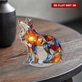 thumbnail image 6 of Rotating acrylic ornament features colorful glass fragments forming a decorative wolf glowing brilliantly in sunlight against a pure white background, 6 of 8