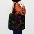 thumbnail image 4 of Xecao's Butterfly Canvas Tote Bag is a versatile choice for women, serving as a stylish beach bag, shopping bag,and reusable grocery bag., 4 of 5