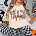 thumbnail image 3 of Halloween Teach Pumpkin Bow T-Shirt, Cute Teacher Graphic Tee, Retro Spooky Season Shirt, Fall Classroom Apparel Gift for Her - Ivory, XL, 3 of 5