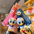 thumbnail image 3 of Disney Anime Cartoon Mickey Mouse Stitch Figure Keychains Kawaii Minnie Donald Duck Piglet Key Chain Model Kid Toy Children Gift, 3 of 5