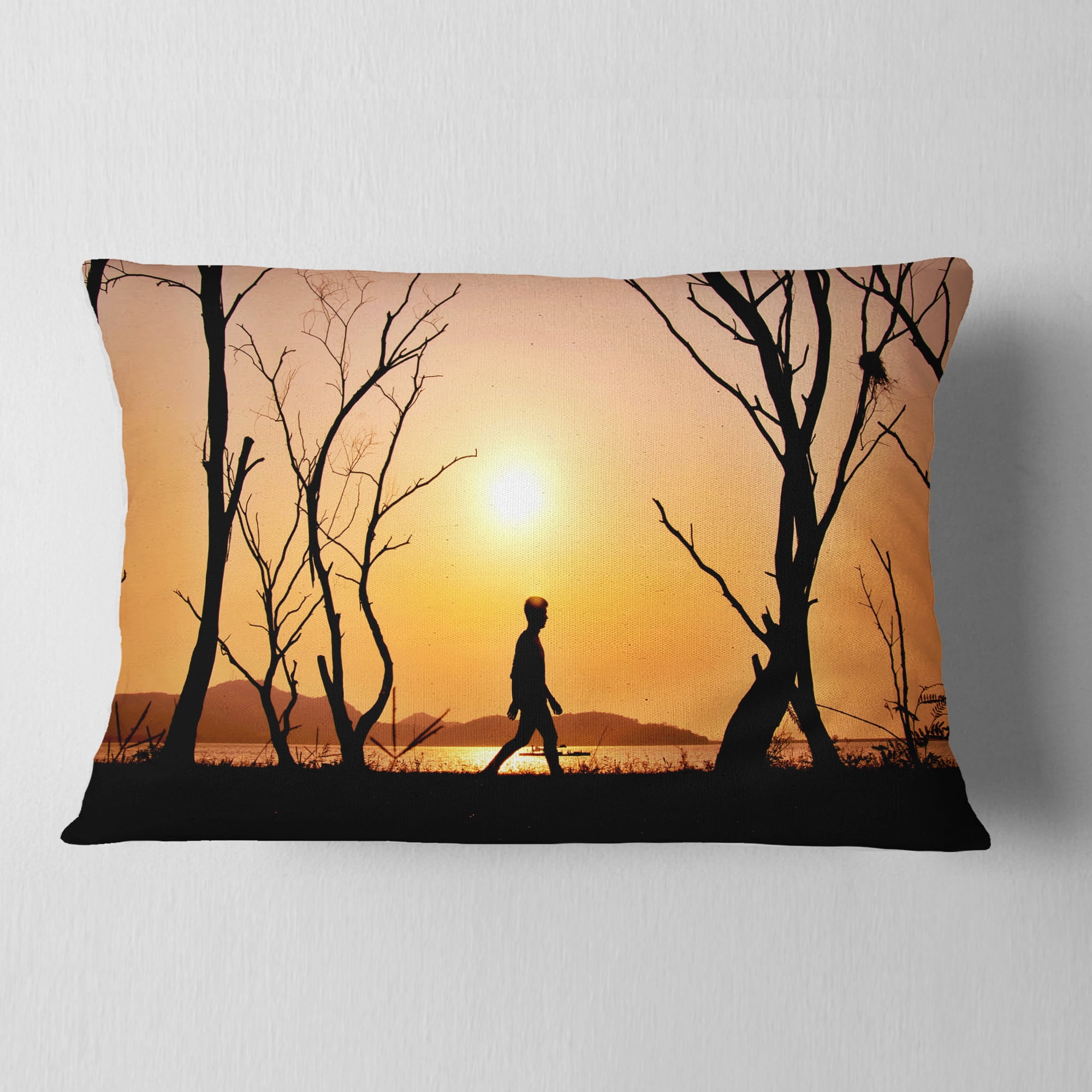 Designart Man Walking Alone in Evening - Landscape Photography Throw Pillow - 12x20