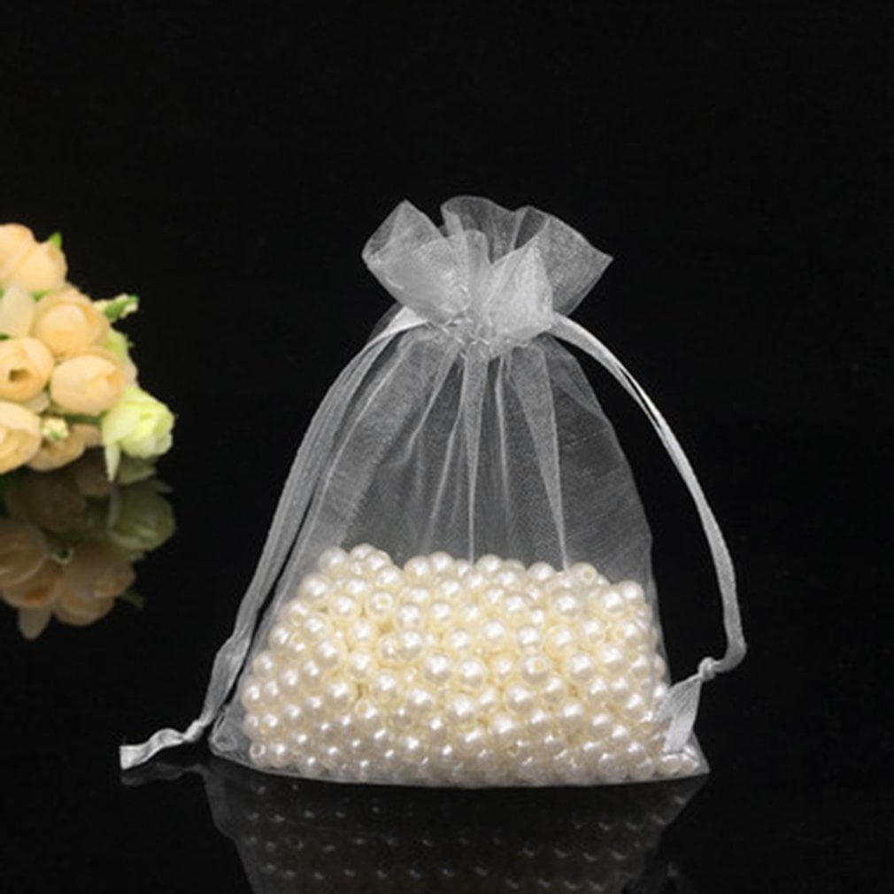 40 affordable white elephant gift ideas that everyone will want to steal 100pcs/lot Drawable White Small Organza Bags 7x9cm Favor Wedding Christmas Gift Bag Jewelry