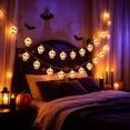 thumbnail image 4 of Skull Shaped String Lights, Warm White Halloween LED Decorative Lights, Spooky Ambient Light Strings, Battery Powered Waterproof Lighting for Indoor Halloween Party Home Decor (59in 10 Lights), 4 of 6
