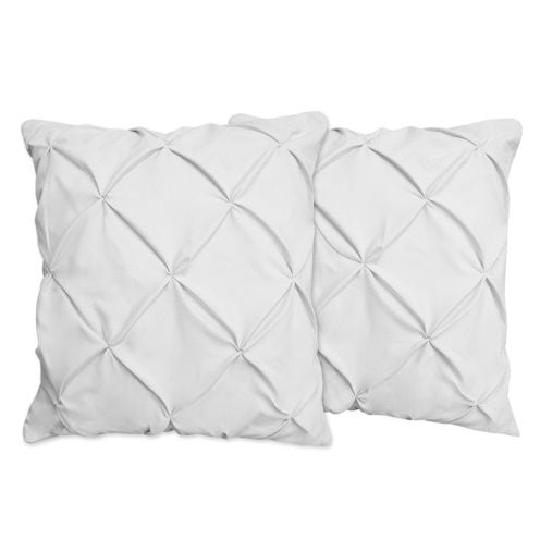 white decorative bed pillows