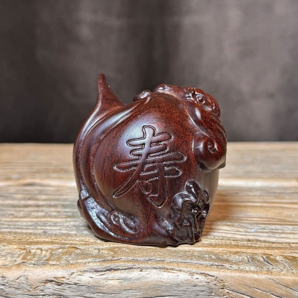 Rosewood carved peach and longevity peach figurine, depicting an old man celebrating his birthday. Ideal for home or office decoration, a redwood gift for elders.