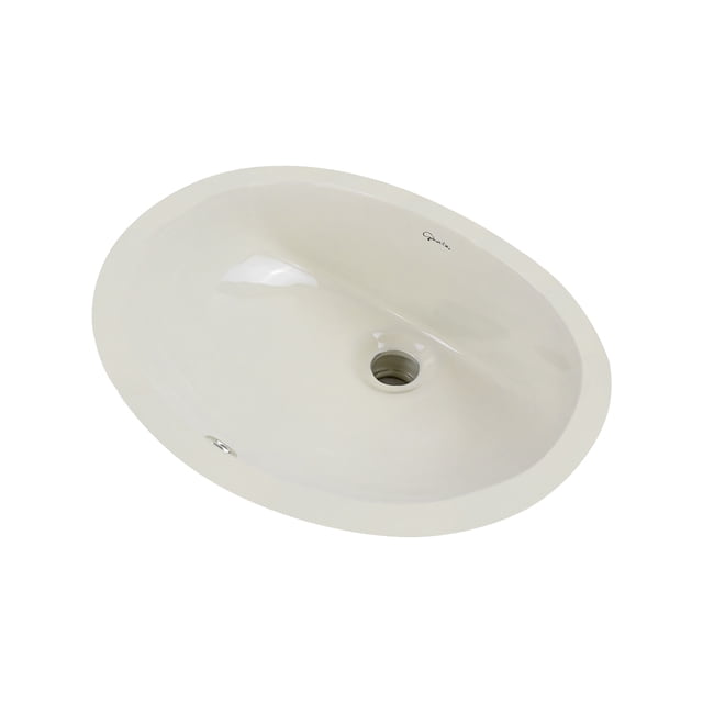 lavabo con rebosadero, bajo cubierta ovalado gravita lb 1787 63b Beige GRAVITA 43 cm x 35 cm, vista cenital oblicua; ovalado empotrable bajo cubierta con borde delgado, desagüe central y rebosadero lateral visibles, acabado liso brillante y fondo poco profundo, para alimentación monomando bajo. A menudo se usa como lavabo auxiliar en baños pequeños.