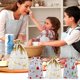 thumbnail image 1 of Bolsas de regalo navideñas con cierre con cordón - Decoraciones de fiesta navideña de papel de aluminio de 39x51 cm - Patrones festivos para botellas de vino, árboles y regalos, 1 of 7