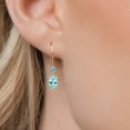 thumbnail image 3 of Gem Stone King 14K Yellow Gold Blue Apatite and Swiss Blue Topaz French Wire Dangle Earrings for Women (1.21 Cttw, Gemstone Birthstone, Oval 6X4MM and Round 2.5MM), 3 of 6