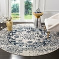 thumbnail image 1 of SAFAVIEH Madison Collection MAD603D Oriental Snowflake Medallion Distressed Non-Shedding Dining Room Entryway Foyer Living Room Bedroom Area Rug, 9' x 9' Round, Cream / Navy, 1 of 5