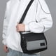 thumbnail image 4 of Bandolera de hombre, bolsa impermeable de nylon para el pecho con correa ajustable y puerto para auriculares para viajes, senderismo y deportes al aire libre, 4 of 6