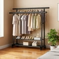 thumbnail image 6 of Yucurem Clothes Rack, Rolling Clothing Racks with 2 Hanging Rods & 2-Tier Bottom Shelf, Bear up to 250lbs for Bedroom Storage (56"x47"x16" Black), 6 of 7
