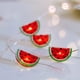 thumbnail image 4 of Luces de cadena de sandía LED | Linternas de frutas de verano | Iluminación decorativa alimentada por batería | Uso portátil en interiores y exteriores | Decoración de Fiesta en Casa | 200x4cm, 4 of 6