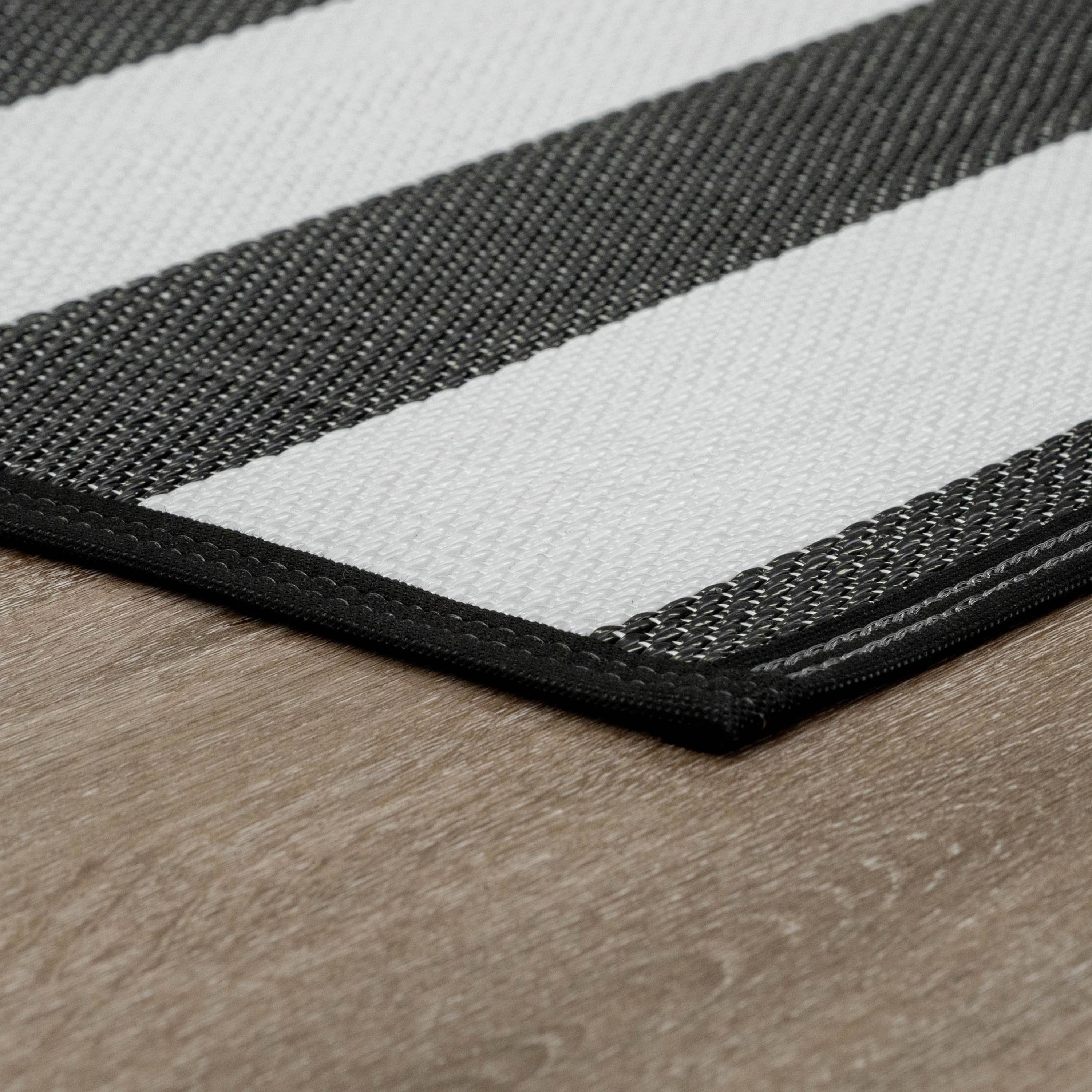 Luna Contemporary Stripe Black and White Polypropylene Reversible Plastic Straw Outdoor Area Rug, 5' x 6'11'' Rectangle