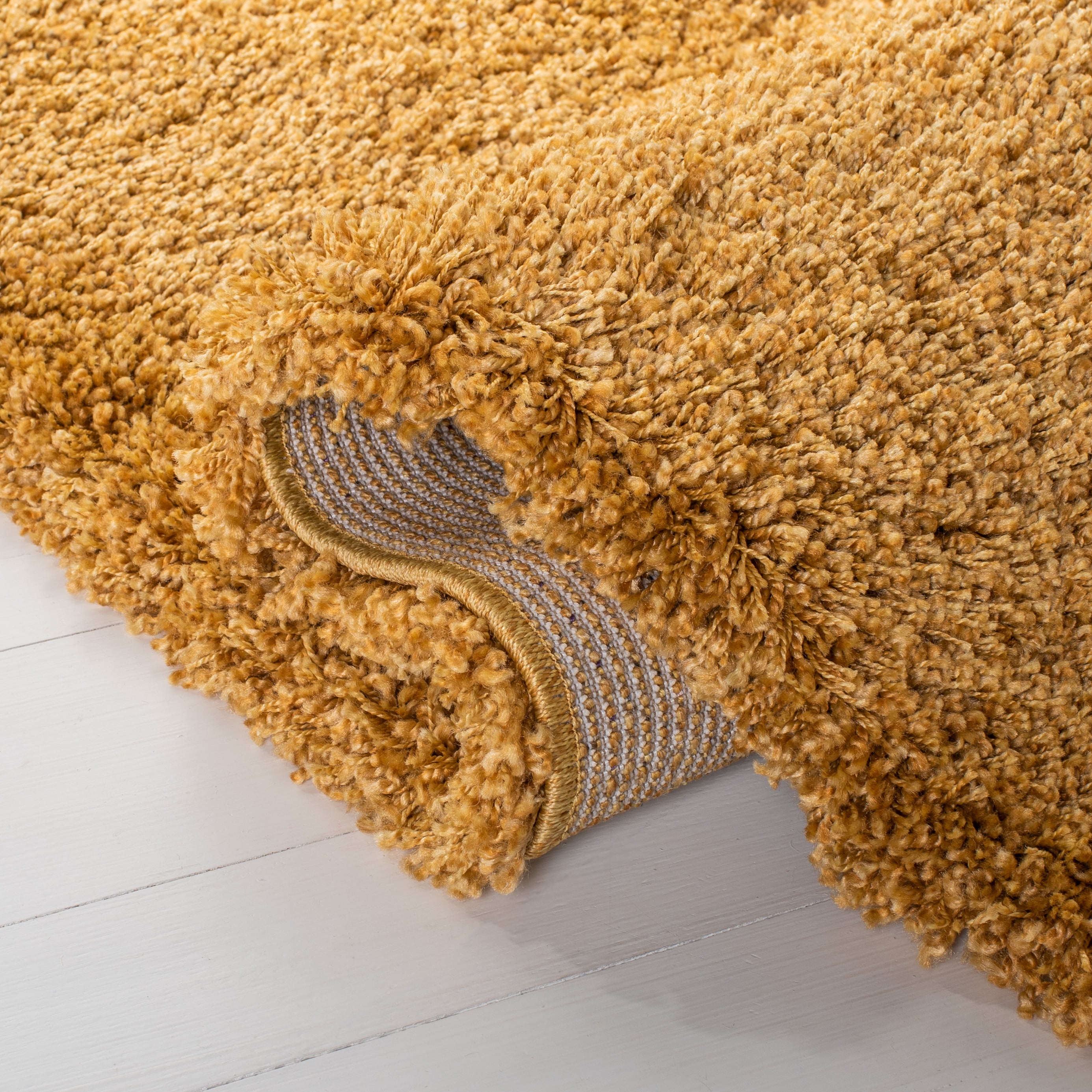 SAFAVIEH Hudson Shag Jackie Solid Area Rug, Gold, 9' x 12'