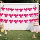 thumbnail image 4 of Lazos para decorar bodas y San Valentín | Paquete de 2 banderines de fieltro morado, rosa y rojo para pared, árbol y regalos, 4 of 7