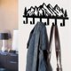 thumbnail image 3 of Juego de ganchos de pared metálicos con diseño de cordillera, perchas y llaveros., 3 of 5