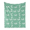 thumbnail image 1 of Ice Skates Soft Flannel Fleece Throw Blanket, Pattern of Goalkeeper Hockey Stick Snowflakes Sports Equipment, Cozy Plush for Indoor and Outdoor Use, 50" x 60", Peacock Green and White, by Ambesonne, 1 of 5