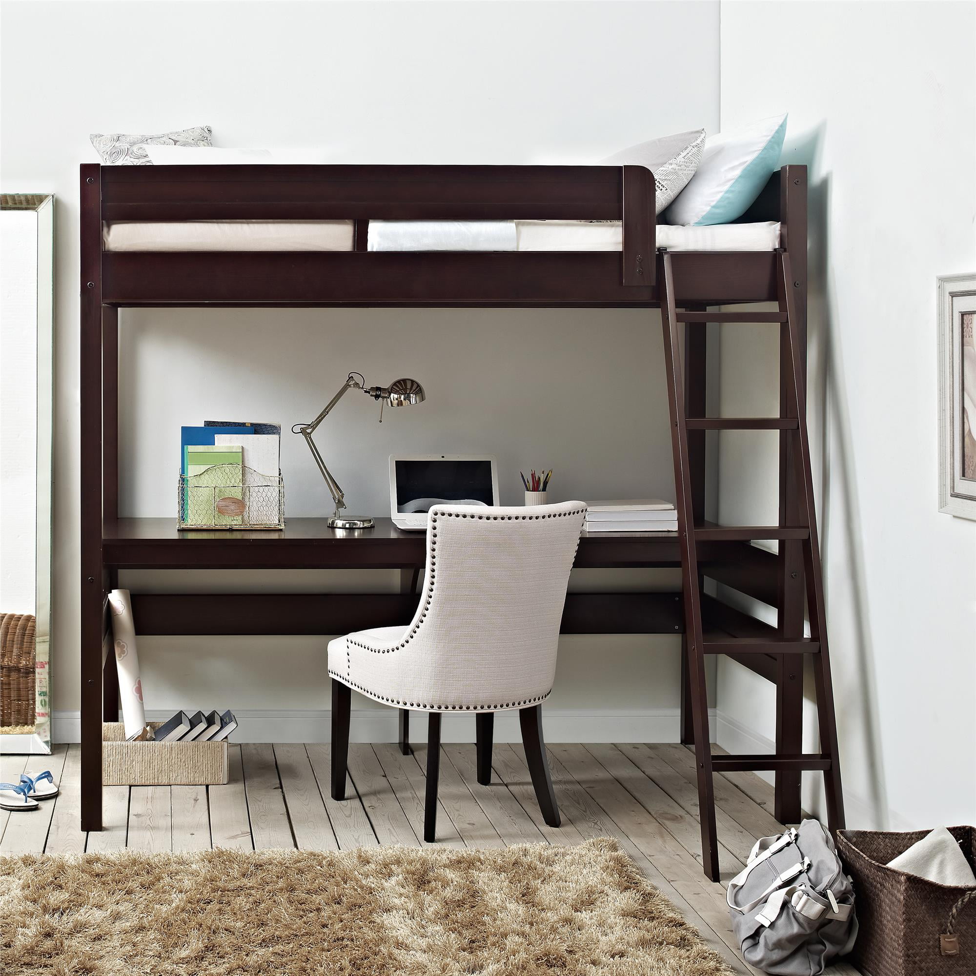 twin bed with desk under