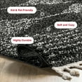 thumbnail image 3 of nuLOOM Bria Moroccan Shag Tasseled Area Rug, 5' 3" x 7' 7", Bria Black, 3 of 9
