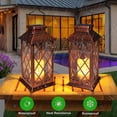 thumbnail image 3 of Paquete de 2 faroles solares colgantes para jardín, luces exteriores, vela parpadeante sin llama, lámpara Led impermeable para mesa, Patio, césped, 3 of 5