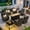 Black, variant on Ovios 9 Pieces Patio Furniture Set with Fire Pit Table Outdoor Conversation All-Weather Rattan Sectional Sofa with Swivel Chairs & Solar Light Table